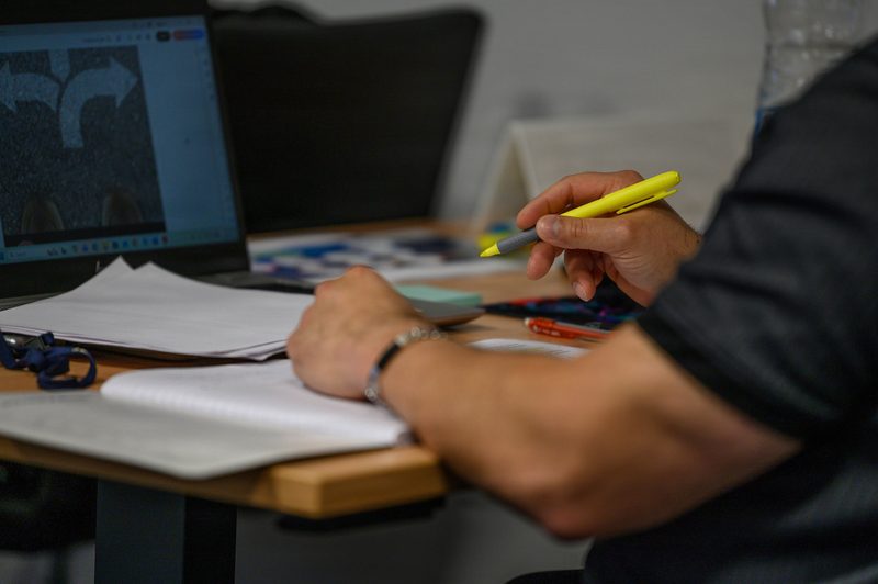 An Airman marks up career-planning materials during a Transition Assistance Program briefing at Spangdahlem Air Base, Germany.